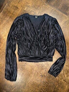 Elegant Black Pleated Wrap Blouse by Carmen Marc Valvo